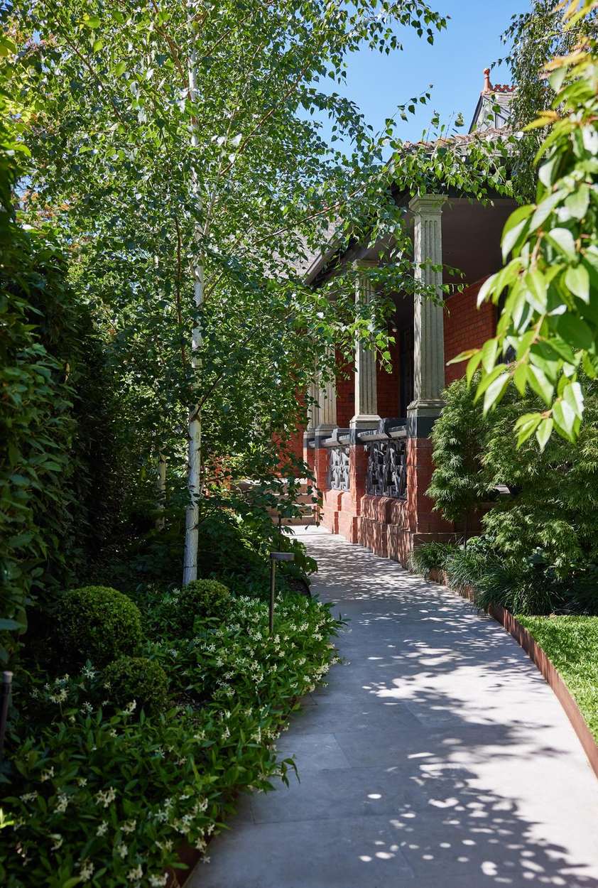 Bluestone path leading to the front verandah, edged in clipped box and star jasmine